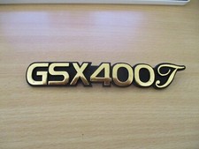 NOS SUZUKI SIDE PANEL BADGE EMBLEM GSX400 GSX400T SEE DESCRIPTION