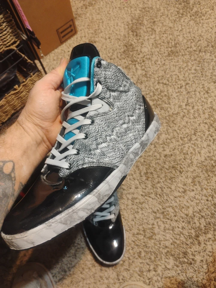 pair of Nike Kobe 9 NSW Lifestyle sneakers in the black and platinum colorway. - Image 4 of 4