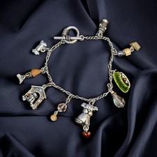 Silver tone dog theme charm bracelet
