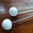 PAIR antique Edwardian milk white glass top 7" long hat pin -C661