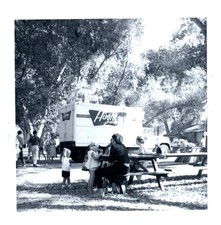 1960s Picnic Area Hughes Market Delivery Truck People at Tables Vintage Photo