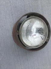1960’s T3 Headlight And Bezel. NOS?
