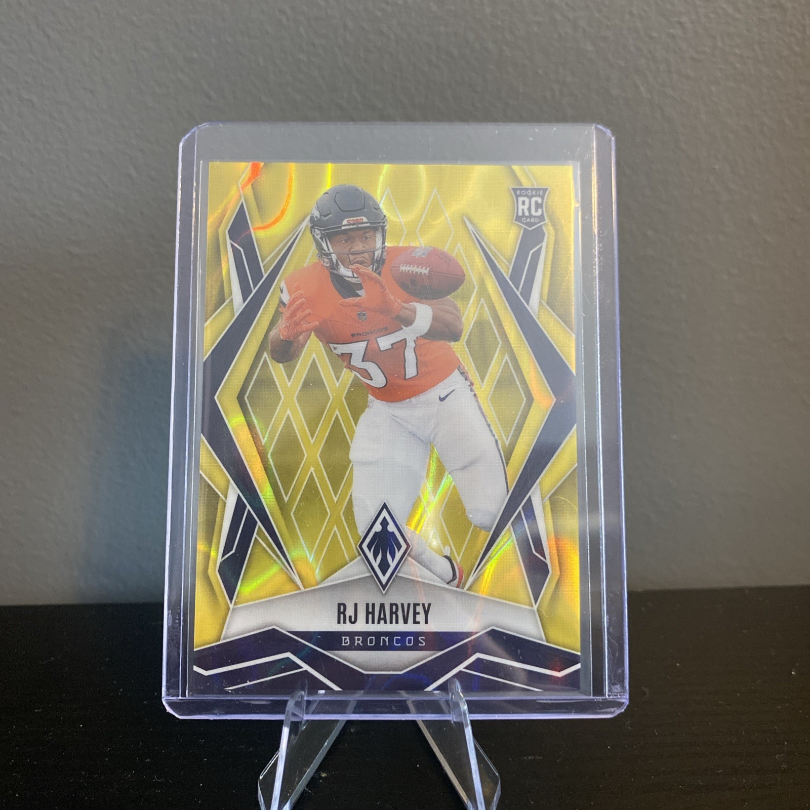 2025 Panini Phoenix RJ Harvey yellow lava Rookie 78/125 #176 Denver Broncos