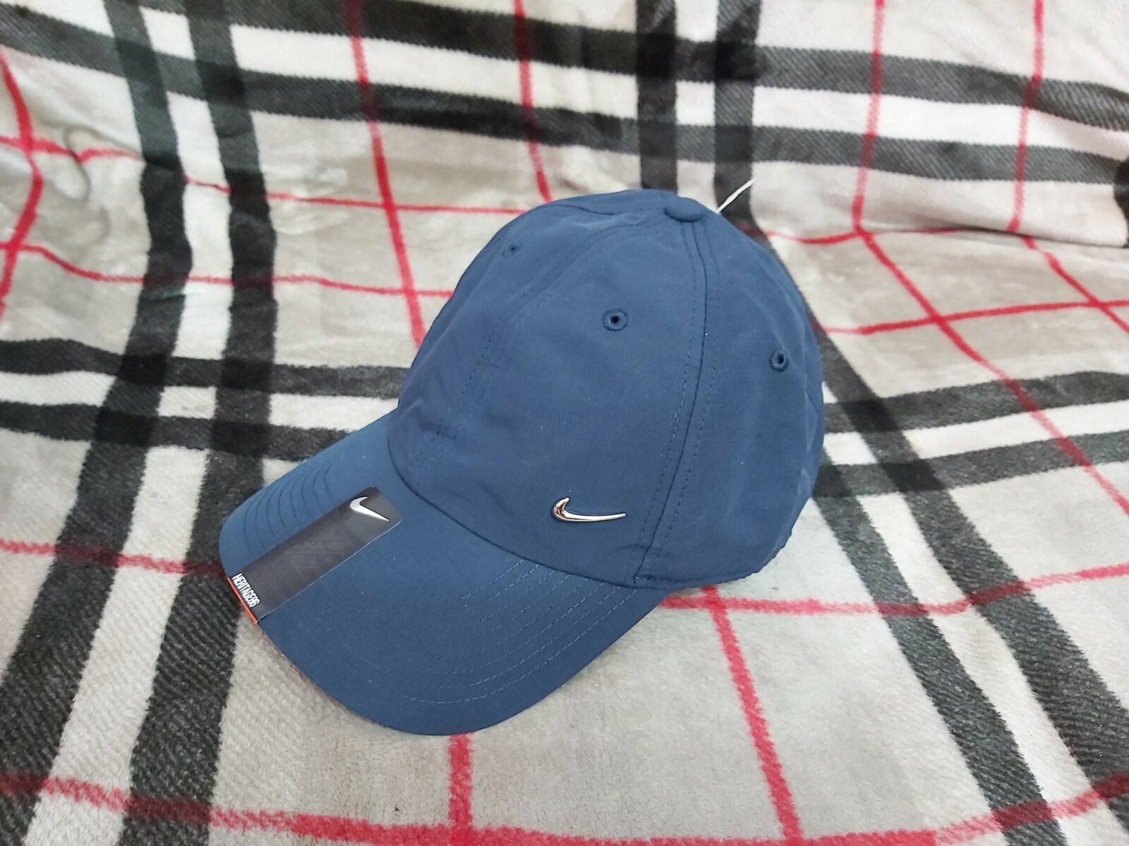 nike metal swoosh hat