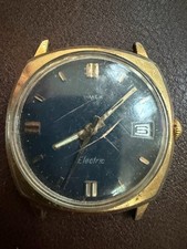 Vintage Timex Electric Cushion Case Date Blue Dial Gold Tone Watch 1970s