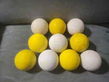 10 used yellow and white lacrosse balls great for practice