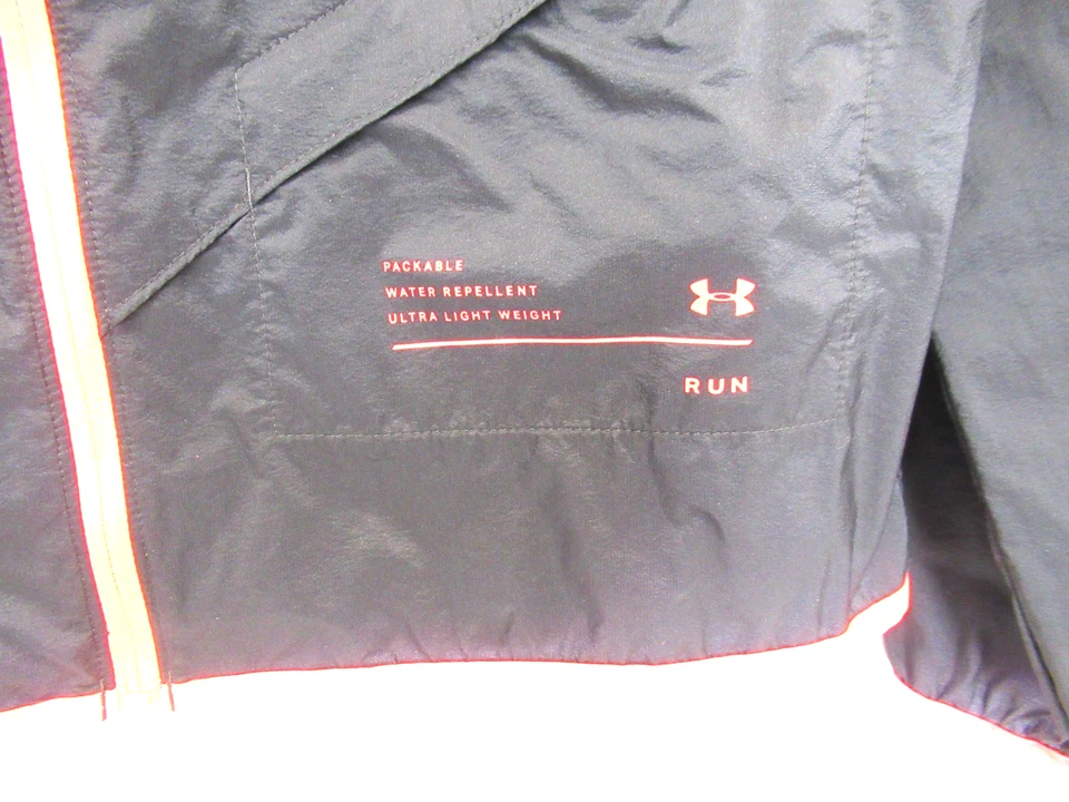 Chaqueta cortavientos Under Armour Heat Gear para mujer grande negra empacable para correr Foto 2 de 4