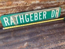 6" x 30" Authentic Used STREET ROAD TRAFFIC SIGN "RATHGEBER DR"
