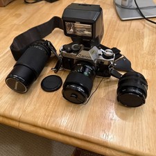 Canon AE-1 Program 35 mm film camera W 52, 55, and 58-200mm Zoom Lense Bundle