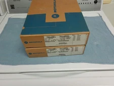 A pair of 2 Motorola VHF HT750 136-174MHz AAH25KDC9AA2AN 4ch open boxes