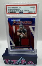 2023 Donruss Optic Blue Hyper Phenoms Atlanta Falcon Rookie Bijan Robinson PSA 7