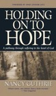 Holding on to Hope : A Pathway Through Suffering to the Heart of