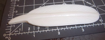 Hand Caved Feather with hole to hang  - made in Custer South Dakota
