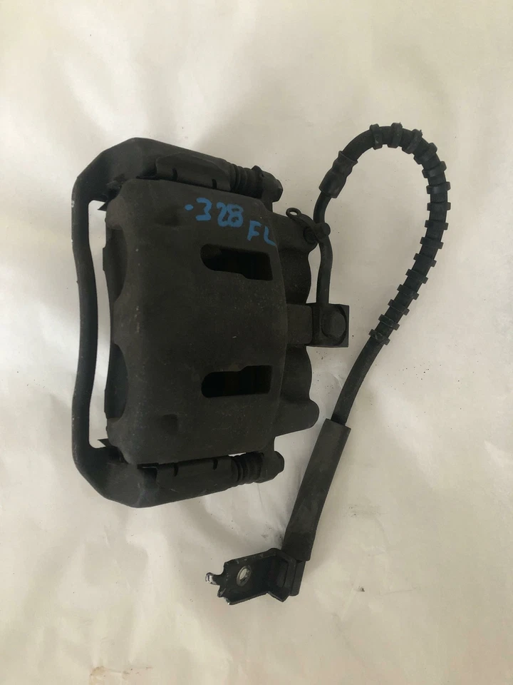 Pinza de disco de freno delantera Ford Ranger 2006-2011 3,0 L A/T lado del conductor izquierdo G Foto 2 de 4