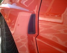 COPPIA GRIGLIE PARAFANGHI ANTERIORI LANCIA DELTA EVOLUZIONE 82487927 82487928