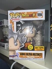 Funko Pop! Vinyl: Dragon Ball - Goku Ultra Instinct #1694 GITD- Hot Topic