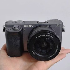 Sony Alpha a6000 24.3MP Mirrorless Digital Camera w/ 16-50mm OSS Lens English