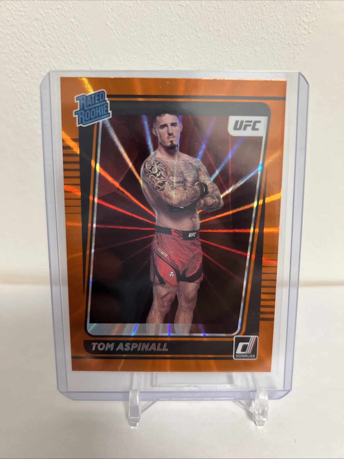 2022 Donruss UFC - Rated Rookie Tom Aspinall #216 Holo Orange Laser (RC)