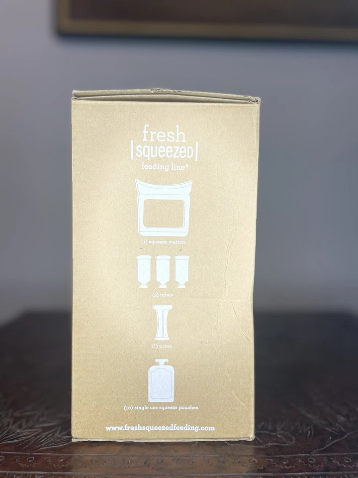 Sistema de alimentación Infantino recién exprimido con prensa y bolsas exprimidoras Foto 2 de 4