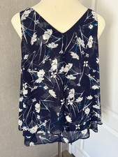 Lane Bryant Navy Floral Camisole is a stylish and comfortable sleeveless top