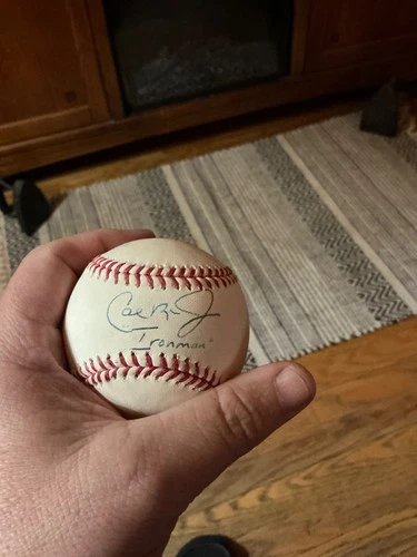 CAL RIPKEN  JR. ORIOLES AUTOGRAPHED BASEBALL   + IRON MAN INSCRIPTION - JSA COA