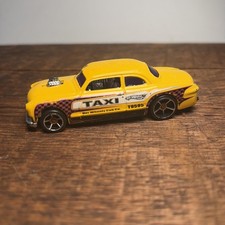 2000. Hot Wheels. Yellow Shoe Box Taxi. Thailand. Loose. Used. 1/64 Scale. C107