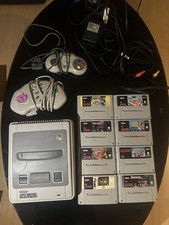 Super Nintendo SNES Console Bundle With Leads Controllers And 8 games