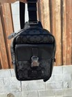 The Coach Crossbody Bag In Black Front Clip Pocket and Big Zipper Closure — photo 2