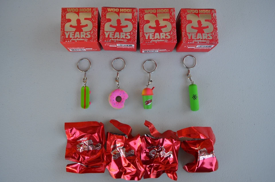 (4 Pack) The Simpsons: 25th Anniversary Keychains - Donut, Squishee, Skateboard - Image 2 of 4