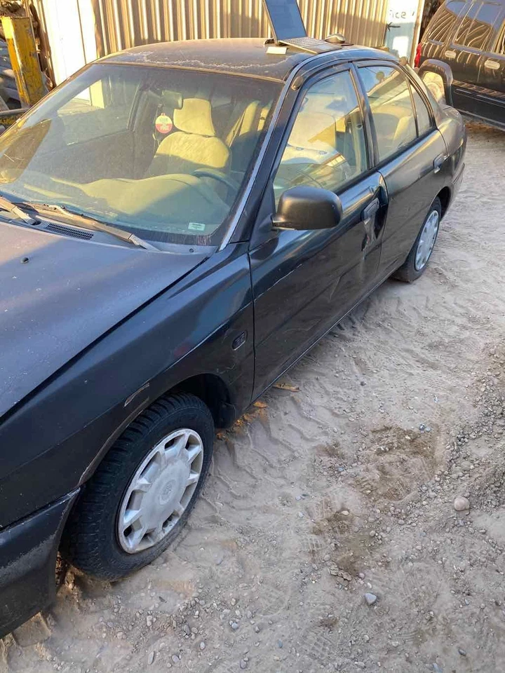 Medidor de velocímetro usado se adapta a: Mitsubishi Mirage Cluster 2001 sin tacómetro negro Foto 2 de 4