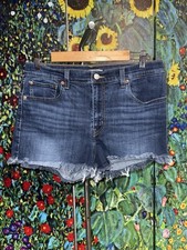 Levi's Size 32 32x2.5 High Waisted Shorts Medium Wash Raw Hem Denim