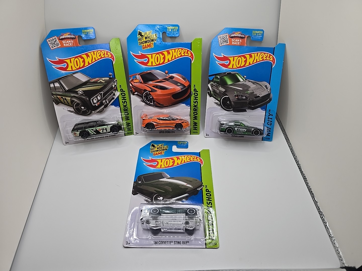 Hot Wheels Lot Of 4 Sealed Honda S2000 Corvette Sting Ray Lotus Datsun Bluebird