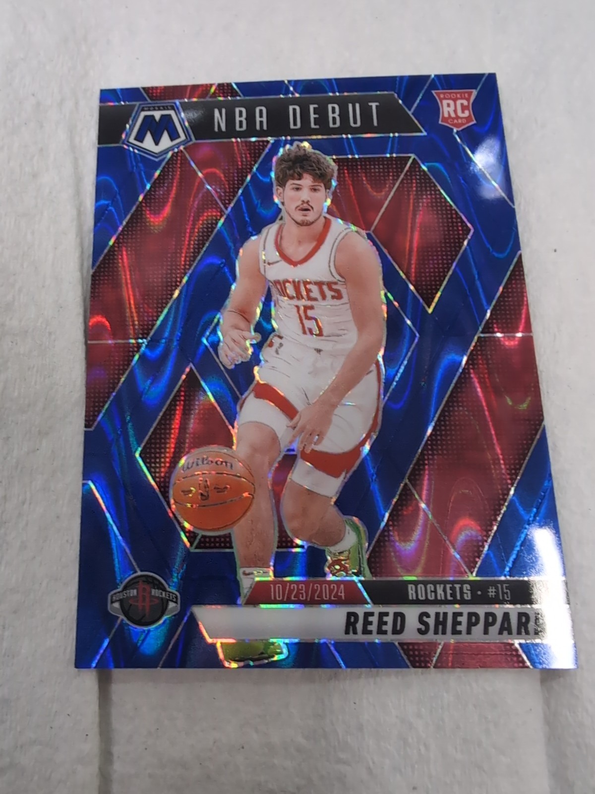 2024-25 Panini Mosaic NBA Debut Reed Sheppard Blue Seismic RC (77/149)