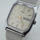 Vintage Timex Quartz Watch Men Silver Barrel Day Date Stretch Analog New Battery