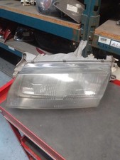 Feu avant (phare) Mazda 323