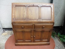 ERCOL GOLDEN DAWN WRITING BUREAU, SOLID ELM,FITTED INTERIOR, WORKING KEY, CLEAN.