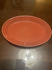 Fiesta Persimmon Small Platter. 9 3/4” X 7”. Flea Bites Shown In Pictures.