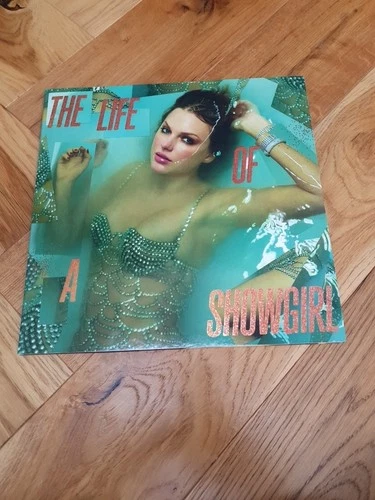 TAYLOR SWIFT THE LIFE OF A SHOWGIRL  ORANGE GLITTER VINYL LP
