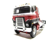DCP FIRST GEAR 1/64 SCALE INTERNATIONAL TRANSTAR CABOVER RED, BLACK &WHITE