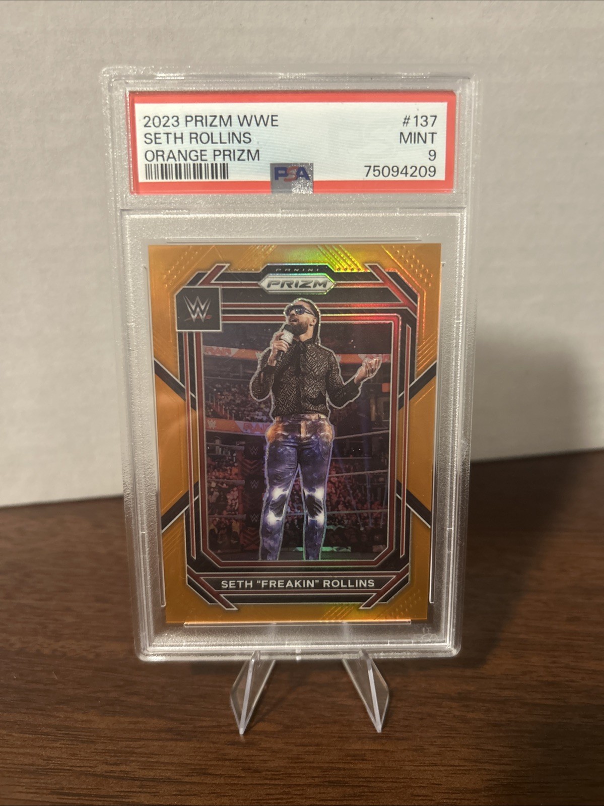 2023 Panini Prizm WWE Seth “Freakin” Rollins #137 ORANGE PRIZM 35/99 RAW