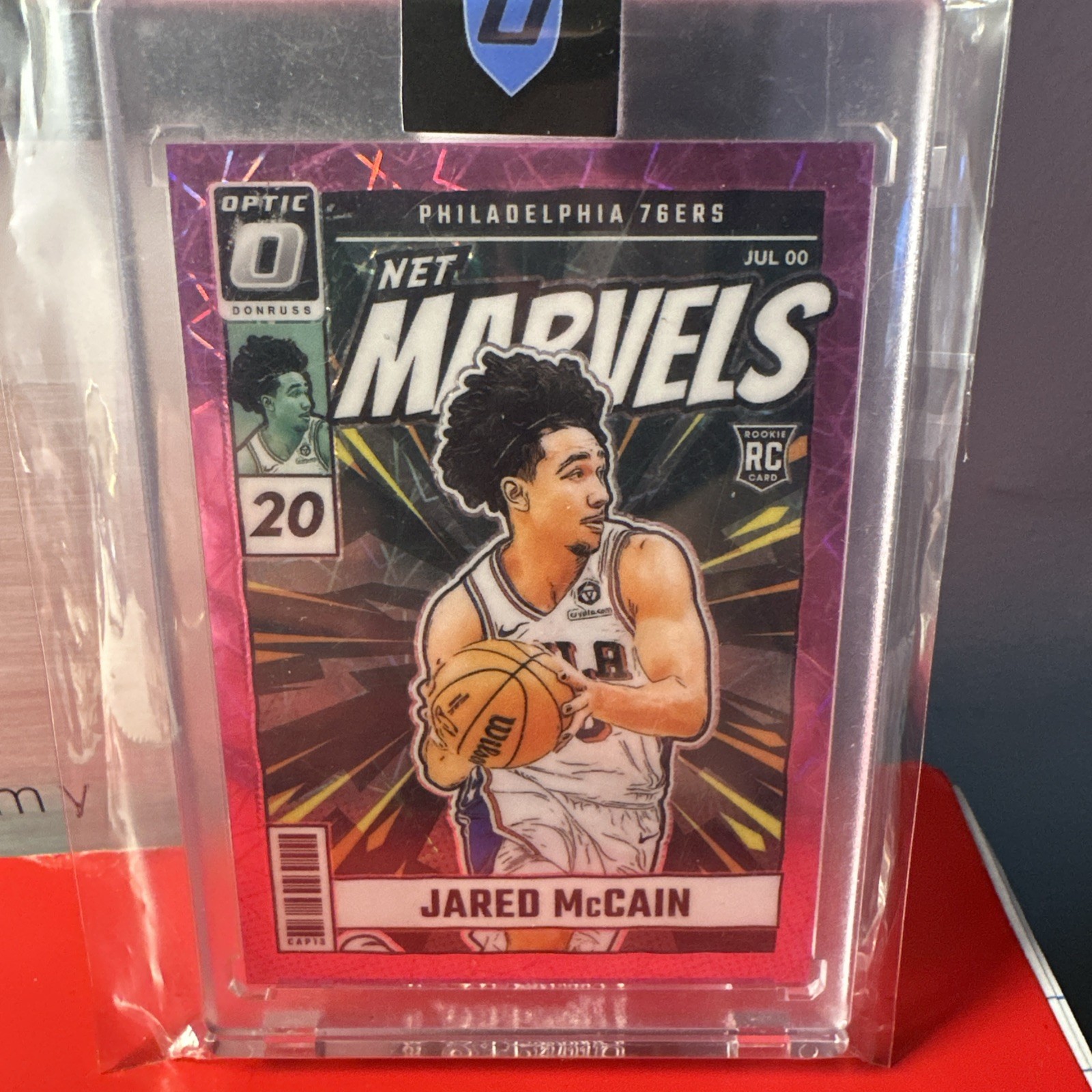 2024-25 Panini Optic - Net Marvels Jared McCain #23 Pink Velocity Prizm /79 (RC)