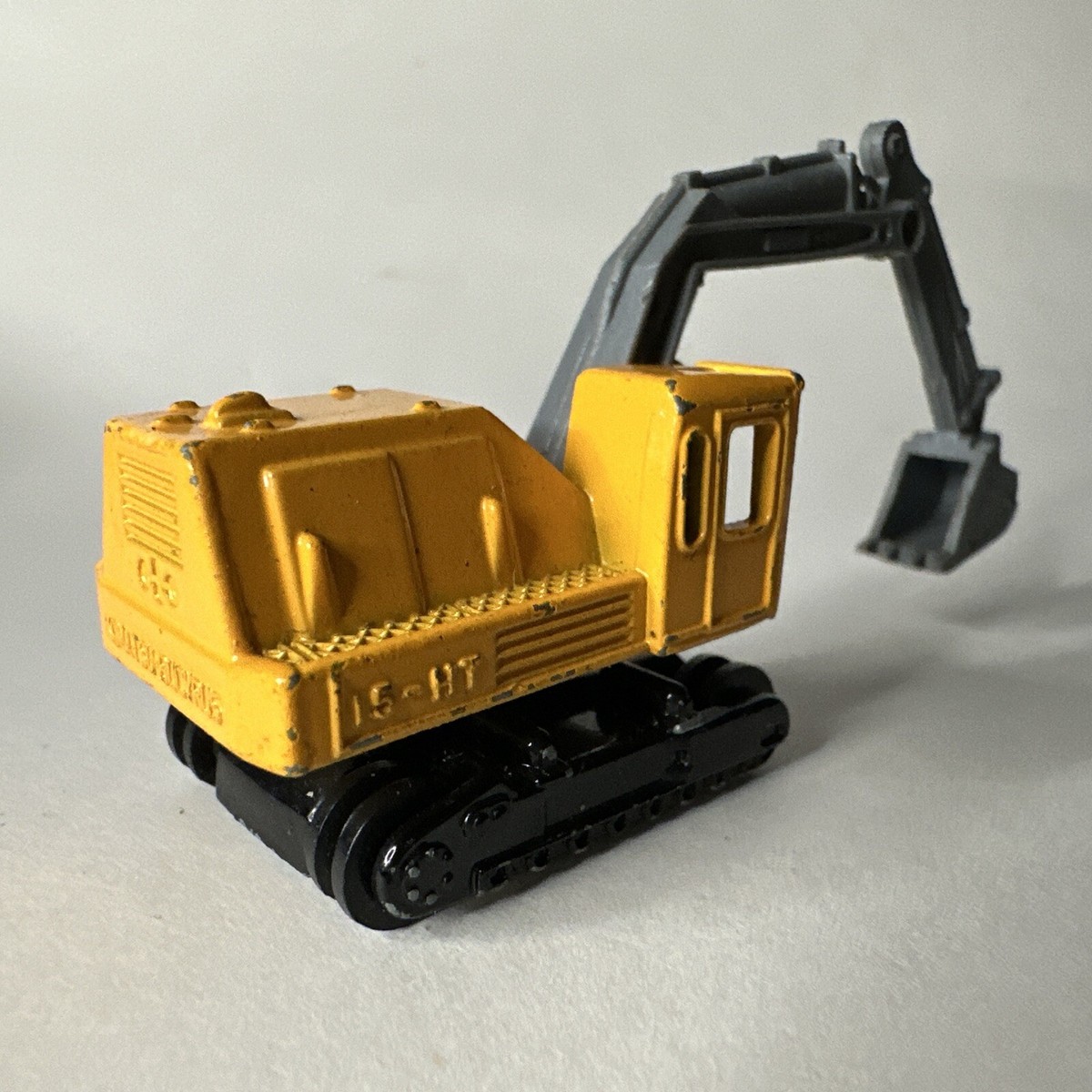 Vintage Tomica Komatsu-Bucyrus 15-HT Excavator / Digger Diecast