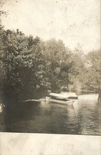 A View of Boats Moored on Sugar River, Durand IL RPPC 1912