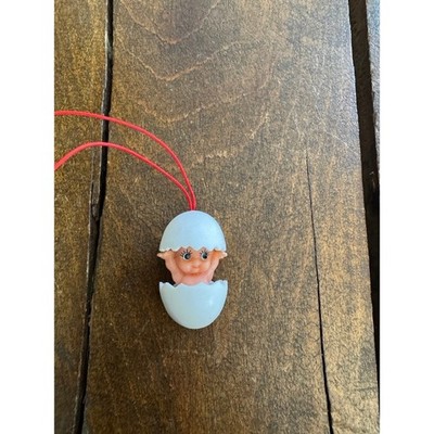 Vintage Kewpie Doll in Eggshell Ornament Mini Baby Charm Red Cord White Egg