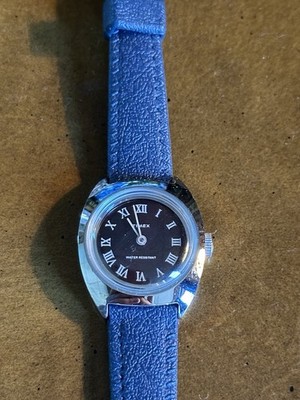 Vintage Timex Water Resistant Black Watch Face wind up watch With Blue Strap
