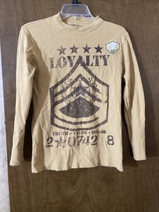 mustard colored long sleeve shirt