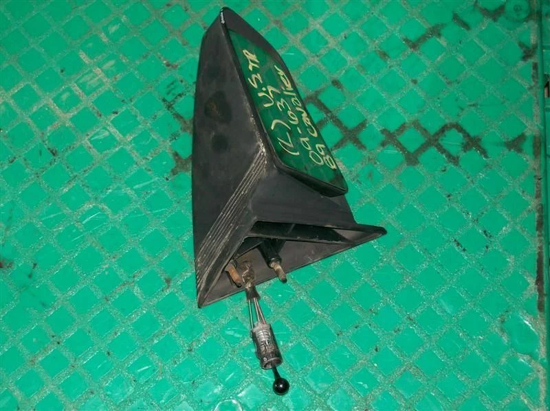 Espejo retrovisor lateral Chevy Cavalier 1989, lado del conductor (LH) Foto 2 de 4