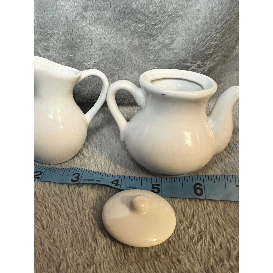 Conjunto miniatura de bule e creme de cerâmica branca design floral rosa - Imagem 4 de 4