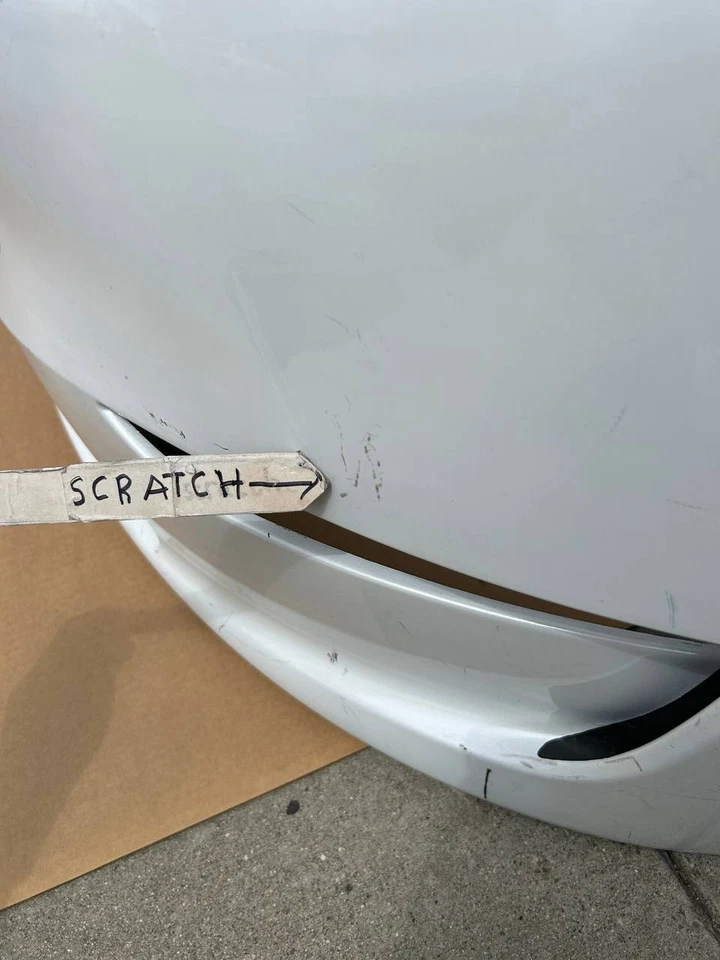 Cubierta de parachoques delantero 22-24 Tesla modelo Y 1687994-TX-A OEM blanca con arañazos Foto 4 de 4