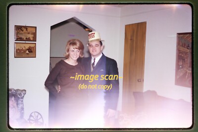 Woman and Man during New Year's in mid 1960s, Kodachrome Slide s14b